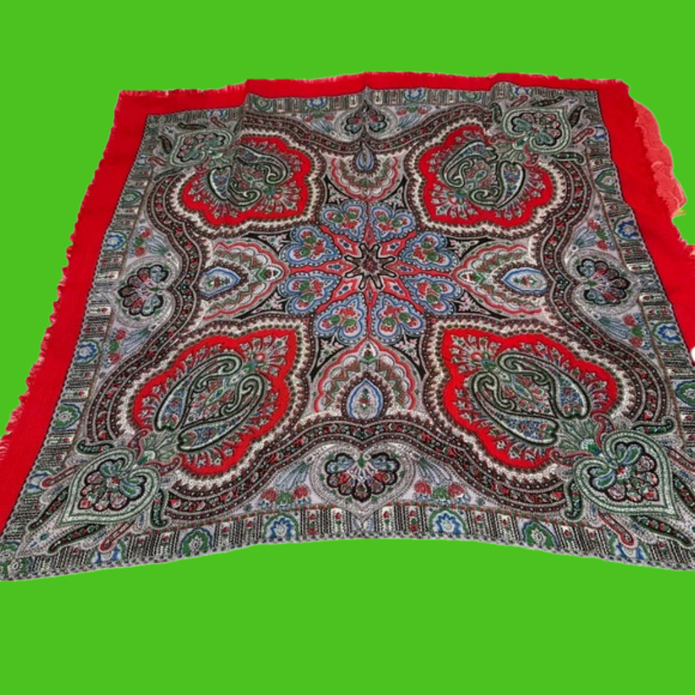 Ladies bright red patterned scarf. Measures 24x23. Fringed edges